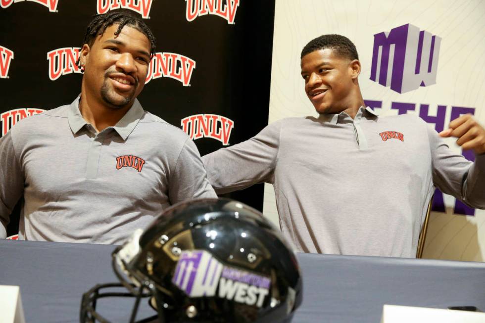 UNLV quarterback Armani Rogers, left, and linebacker Javin White talk to reporters during Mount ...