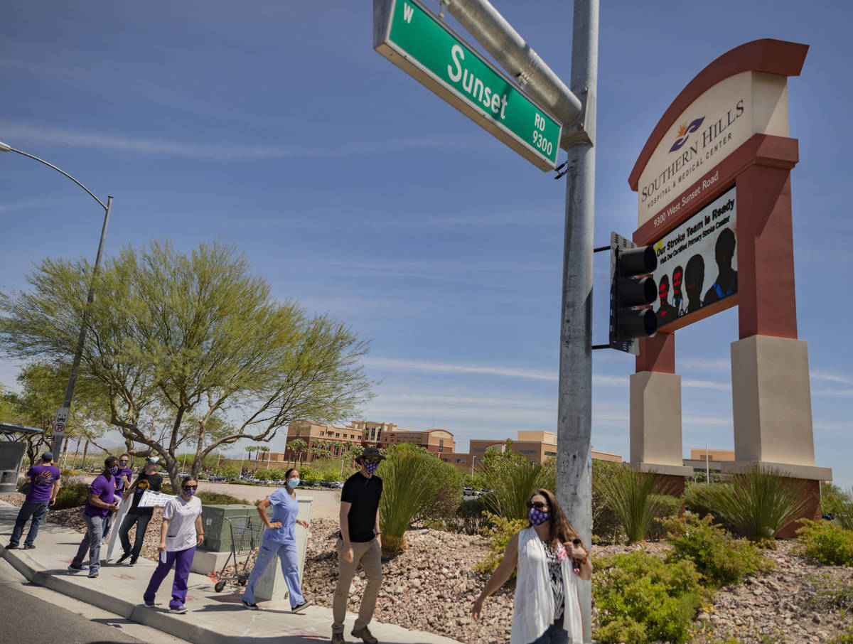 Local SEIU 1107 members honor other frontline health care workers and list demands for more pro ...