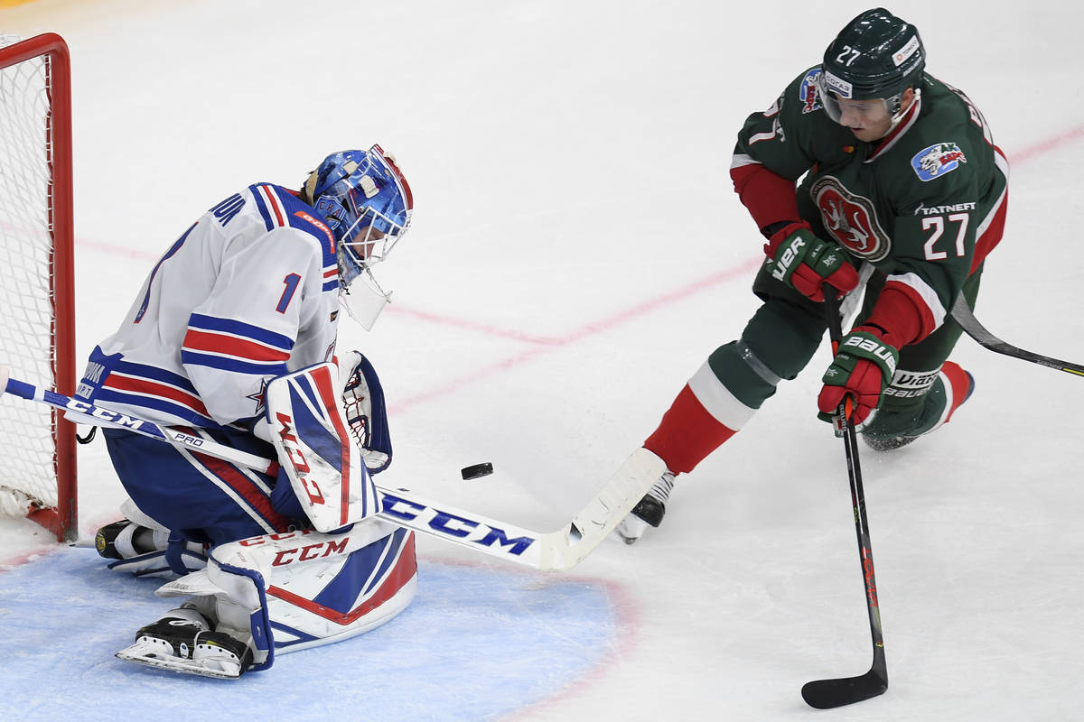 SKA's goaltender Alexei Melnichuk makes a save against Ak Bars' Kirill Petrov during the Kontin ...