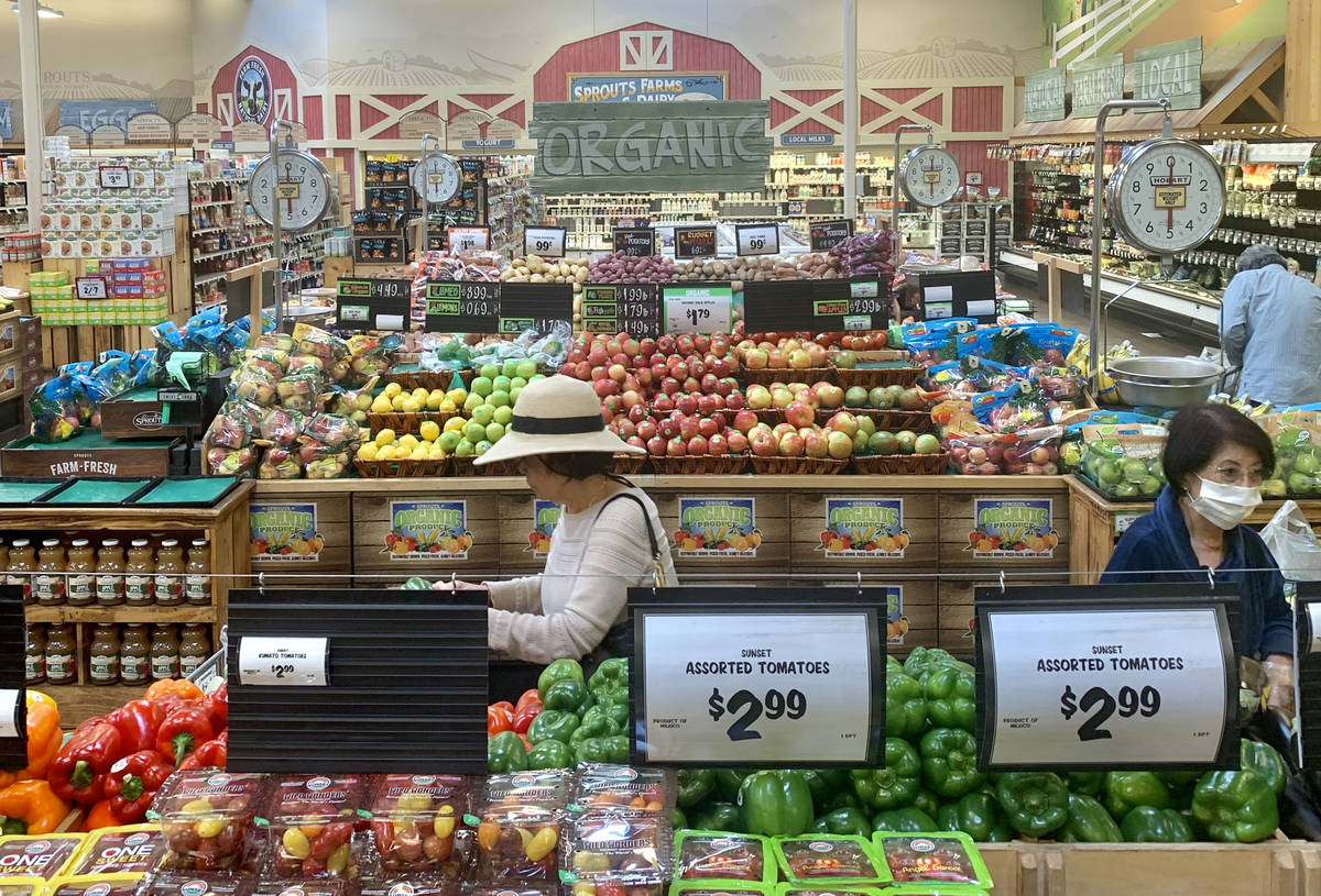 Shoppers pick fresh produce at the Sprouts Farmers Market on North Stephanie Street in Henderso ...