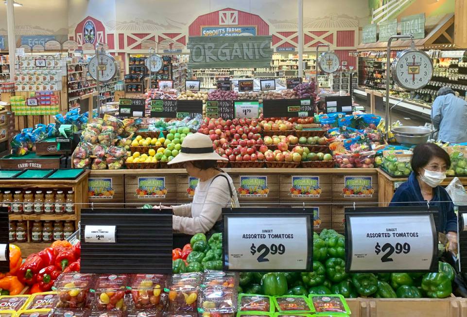 Shoppers pick fresh produce at the Sprouts Farmers Market on North Stephanie Street in Henderso ...