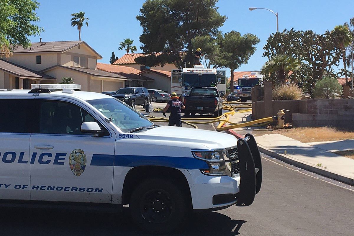 Crews battle a fire Thursday, April 30, 2020, on the 300 block of Esquina Drive in Henderson. ( ...