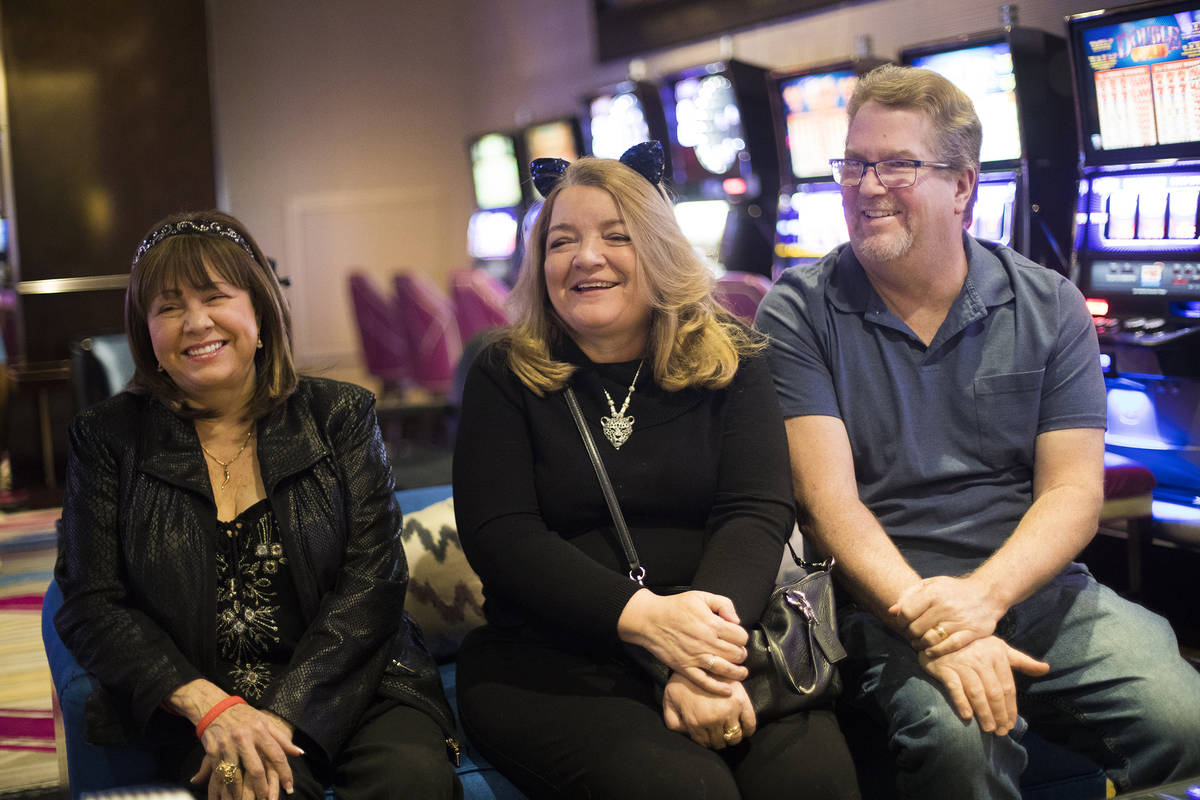 Diana Evoni, from left, Heidi Clemmons and her husband Fred Clemmons talk to the Review-Journal ...