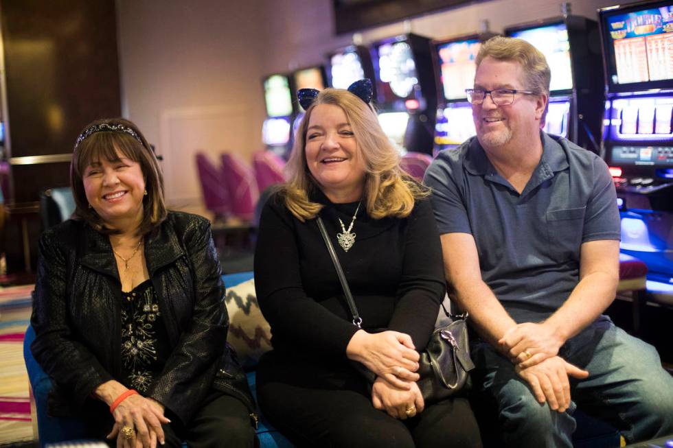 Diana Evoni, from left, Heidi Clemmons and her husband Fred Clemmons talk to the Review-Journal ...