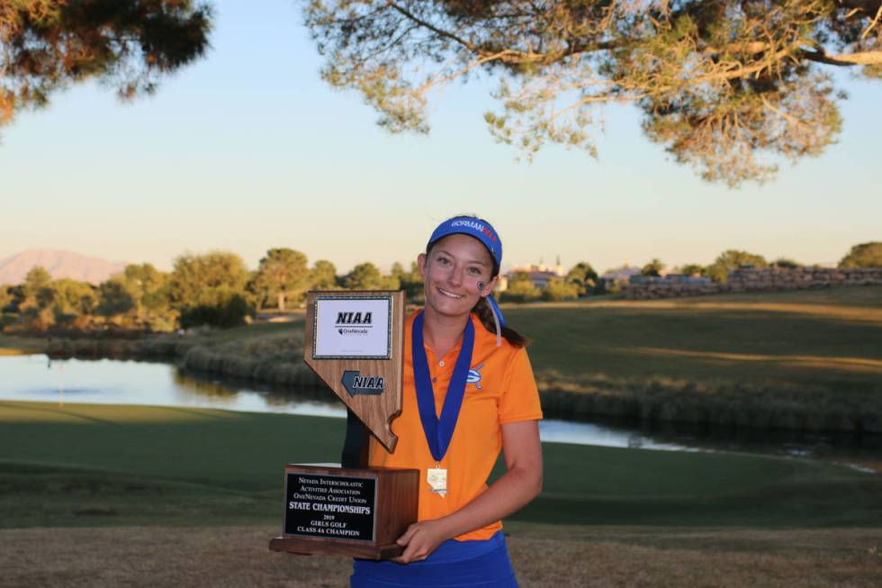 Bishop Gorman High School senior Sloan Pyatt celebrates winning the NIAA girls golf championshi ...