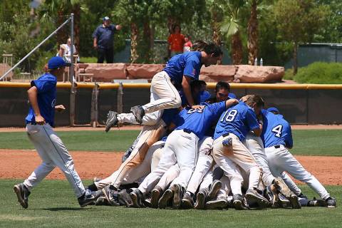 Members of the Bishop Gorman State Championship Baseball team celebrate their victory-May 19, ...