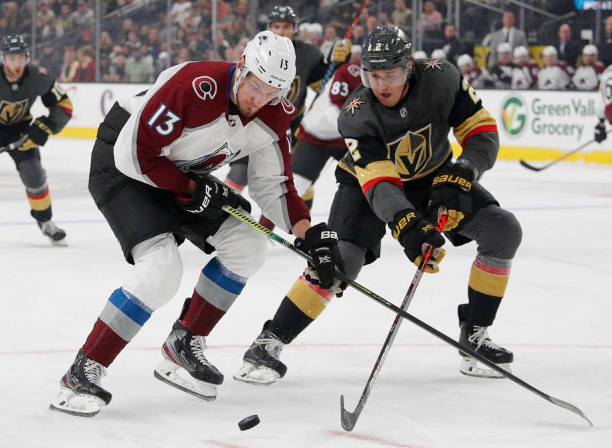 Colorado Avalanche right wing Valeri Nichushkin (13) and Vegas Golden Knights defenseman Zach W ...