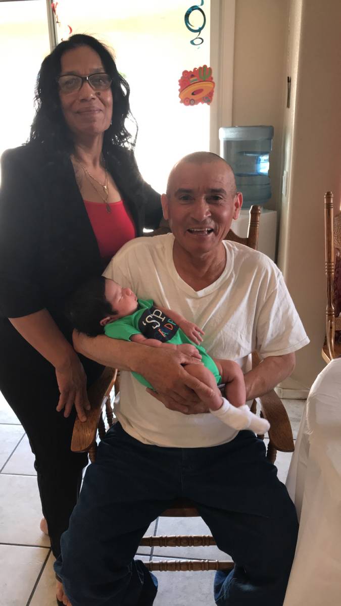 Maria Ascencion Garcia-Rodelo and David Garcia with their grandchild Levi Kenta Koch.