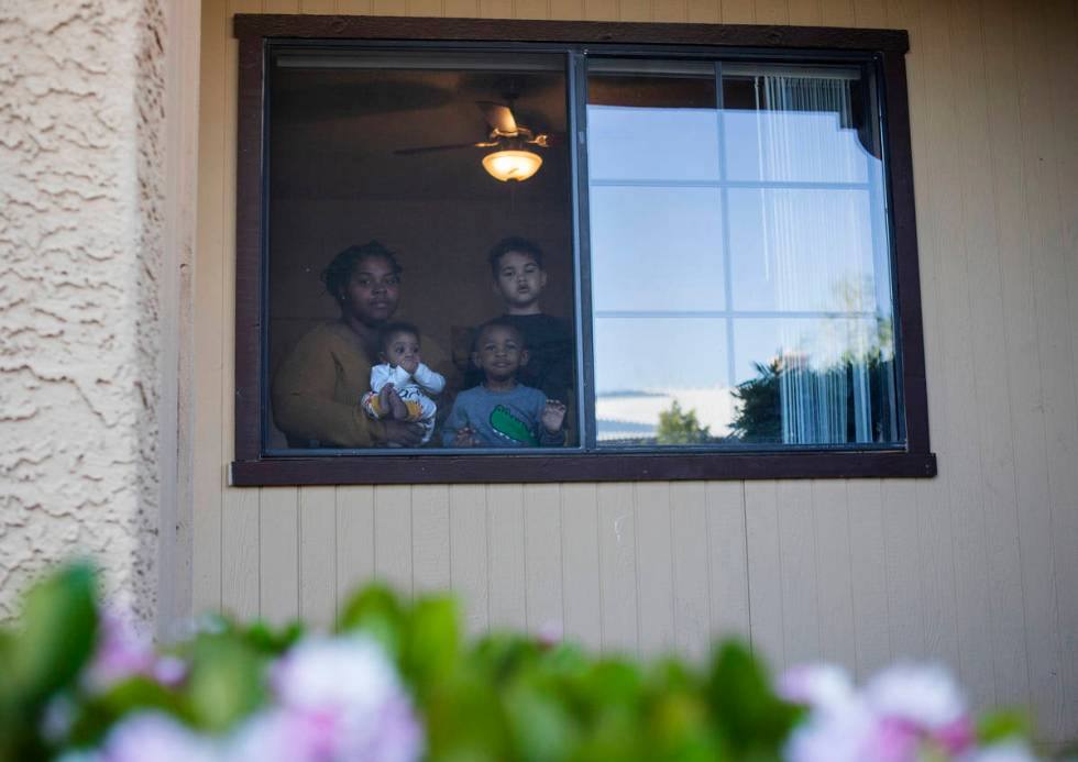 Vanavia Weatherly and her three children of Las Vegas. (Ellen Schmidt/Las Vegas Review-Journal) ...