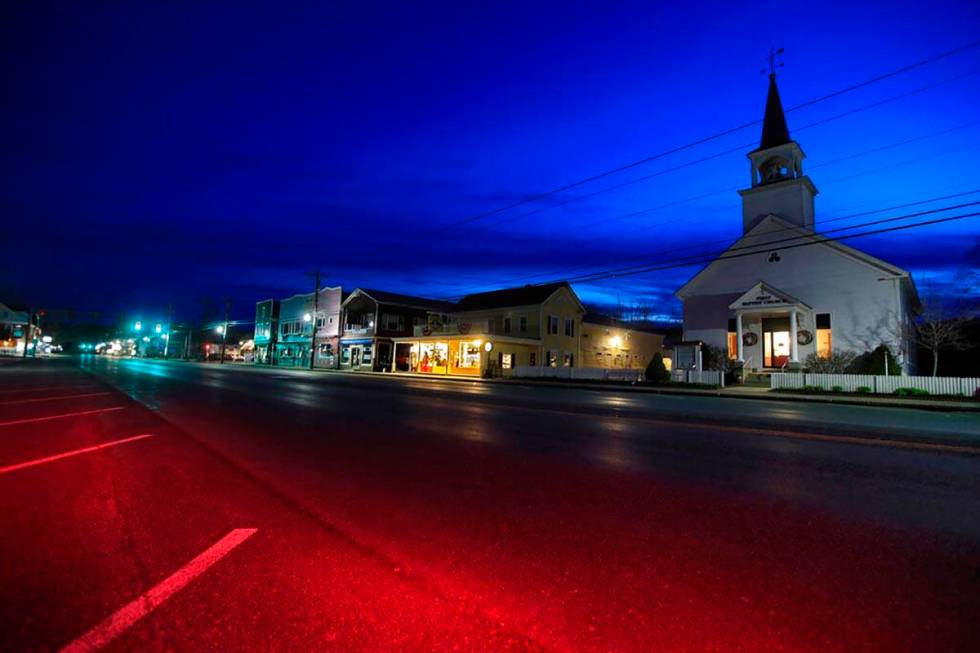 The First Baptist Church and small shops remain closed during the coronavirus pandemic, Sunday, ...