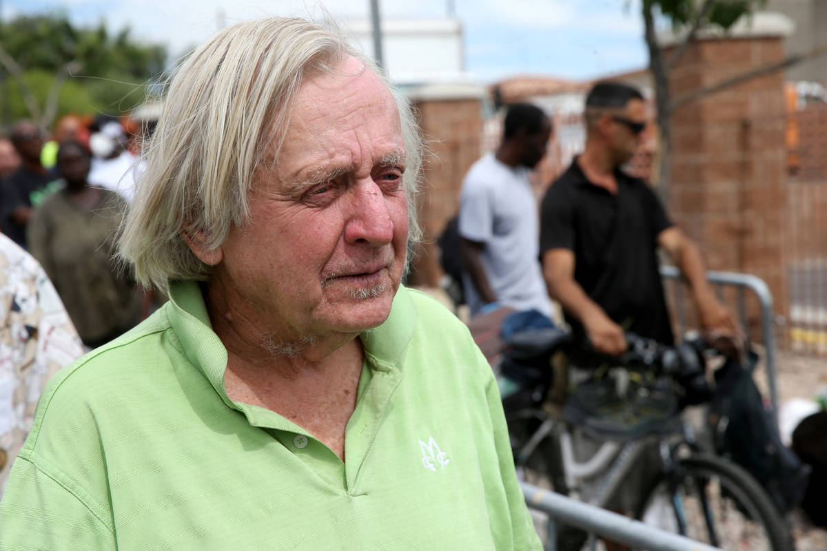 Robert Godleski, 73, lines up for a meal at Catholic Charities on Foremaster Lane between Las V ...