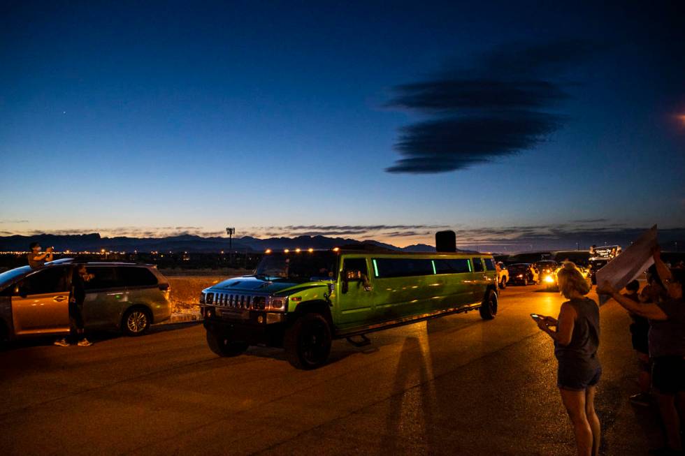 Desert Oasis High School students participate in a senior prom parade in Las Vegas on Friday, M ...