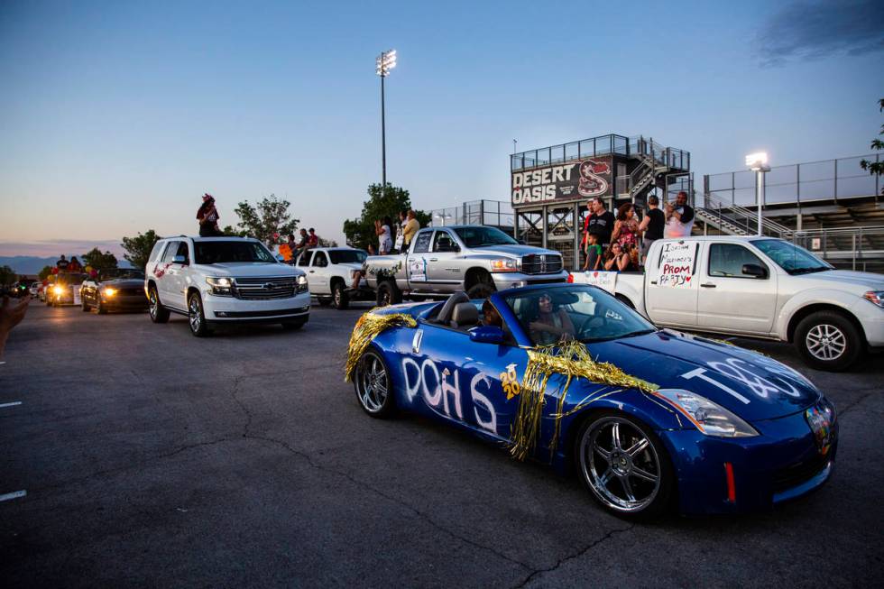 Desert Oasis High School students participate in a senior prom parade in Las Vegas on Friday, M ...