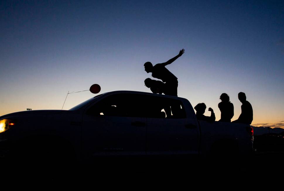 Desert Oasis High School students participate in a senior prom parade in Las Vegas on Friday, M ...