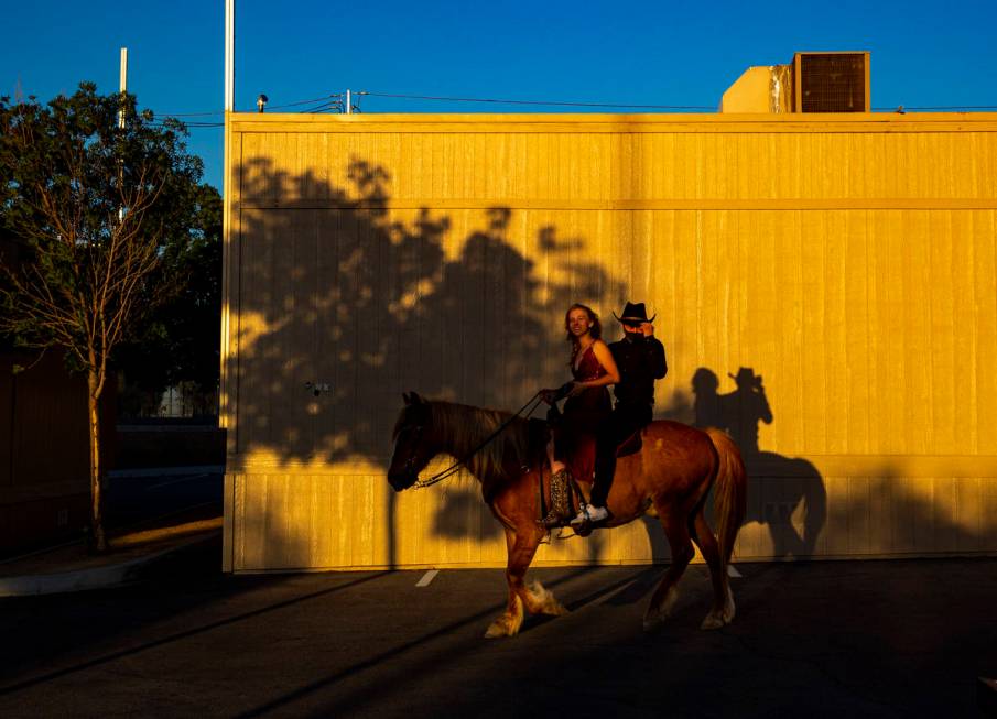 Desert Oasis High School seniors Kenzie Matthews, left, and Logan Johnson get ready to particip ...