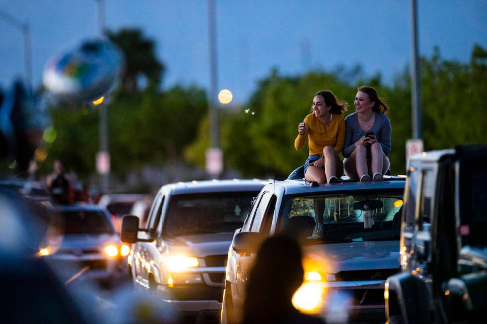 Desert Oasis High School students participate in a senior prom parade in Las Vegas on Friday, M ...