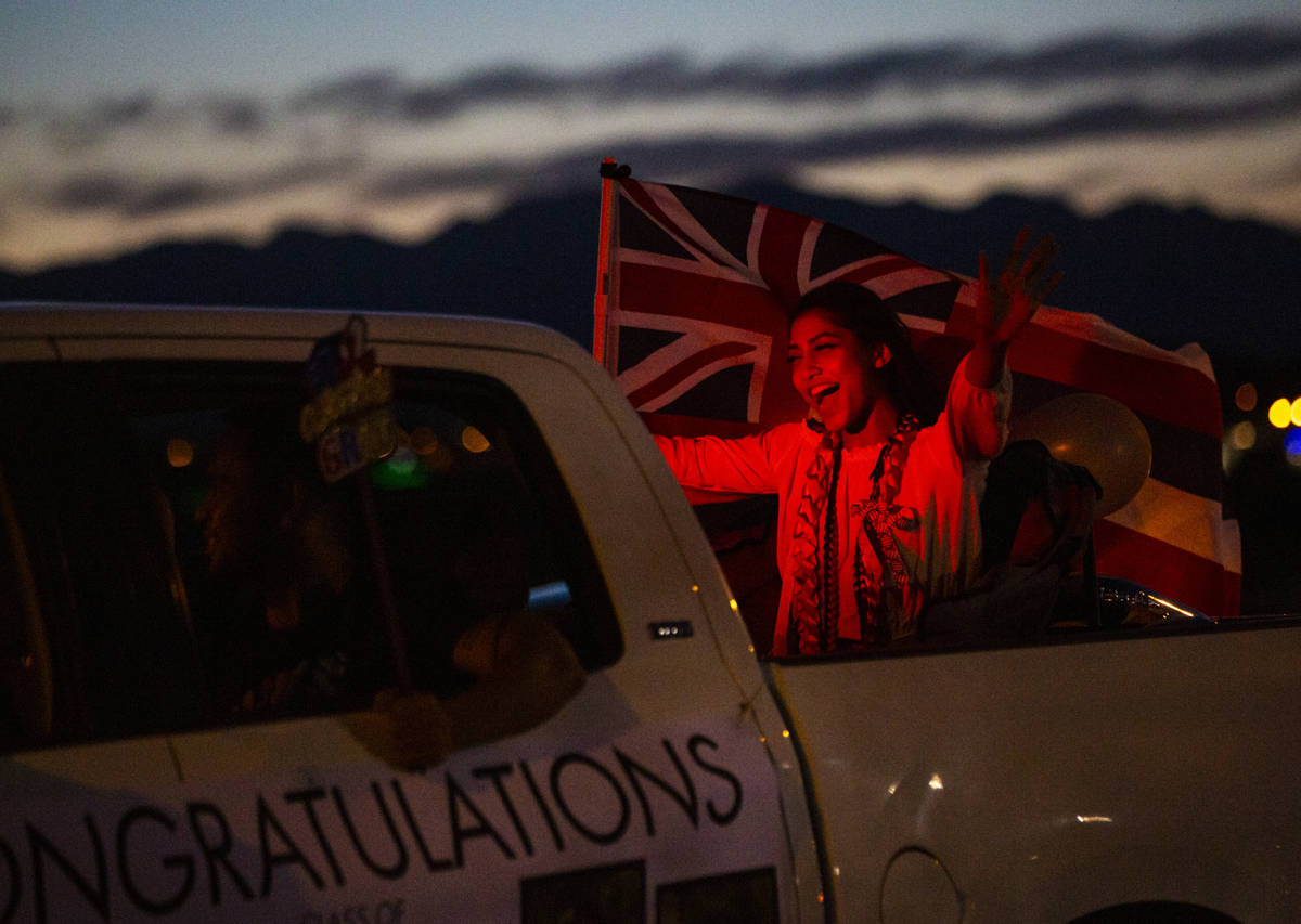 Desert Oasis High School students participate in a senior prom parade in Las Vegas on Friday, M ...