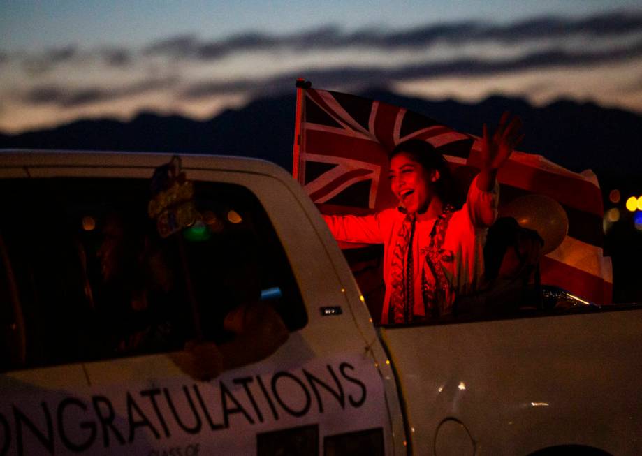 Desert Oasis High School students participate in a senior prom parade in Las Vegas on Friday, M ...