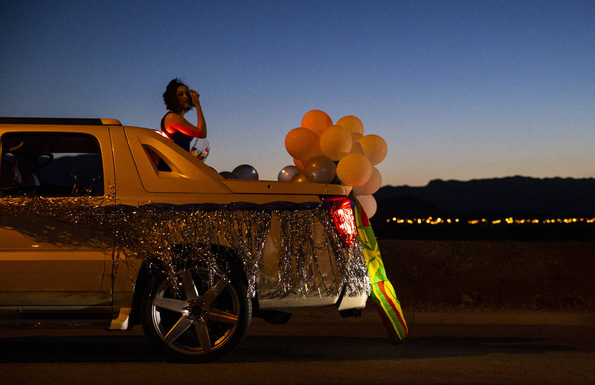 Desert Oasis High School students participate in a senior prom parade in Las Vegas on Friday, M ...