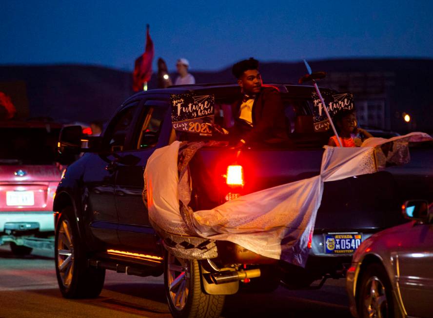 Desert Oasis High School students participate in a senior prom parade in Las Vegas on Friday, M ...