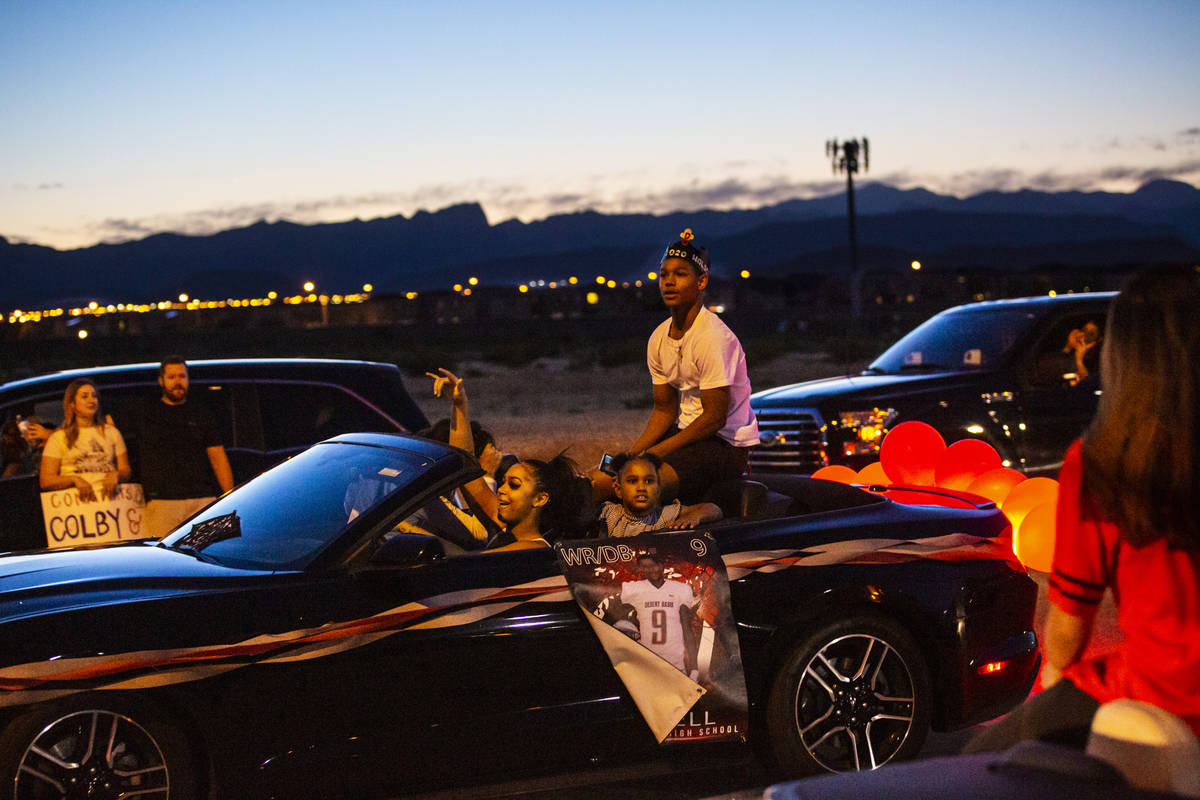 Desert Oasis High School football player Jimmy Halsell participates in a senior prom parade in ...