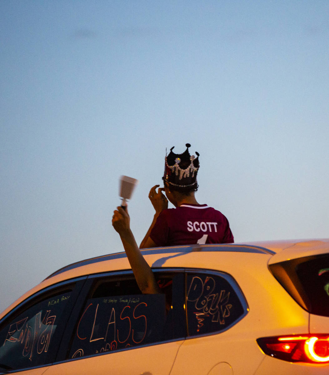 Desert Oasis High School students participate in a senior prom parade in Las Vegas on Friday, M ...