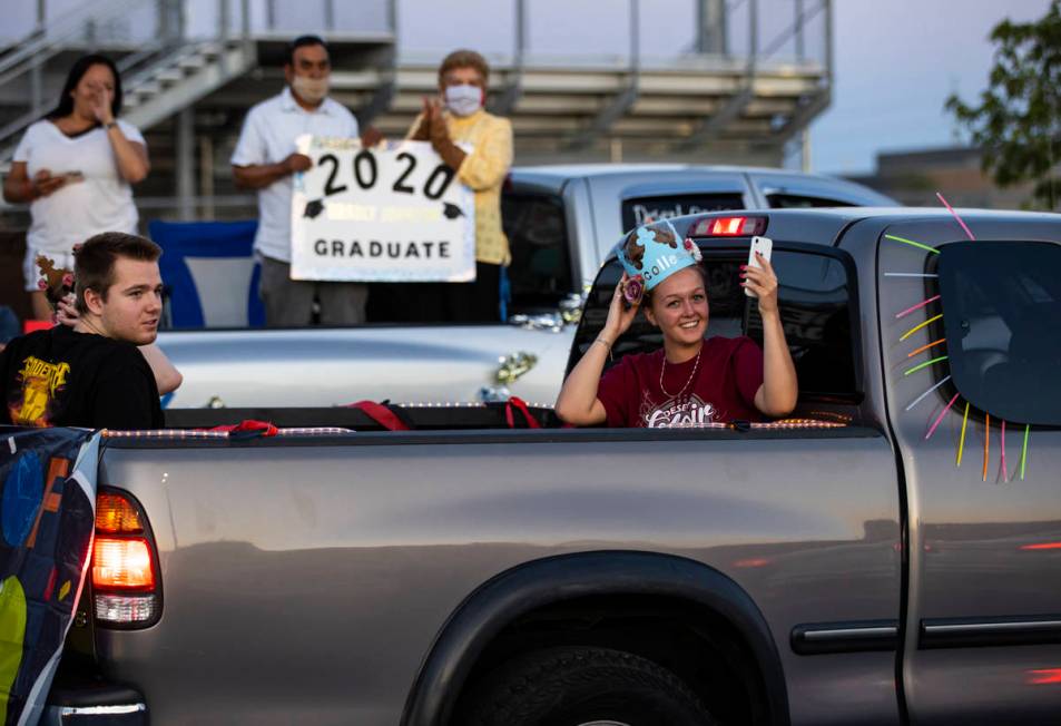 Desert Oasis High School students participate in a senior prom parade in Las Vegas on Friday, M ...