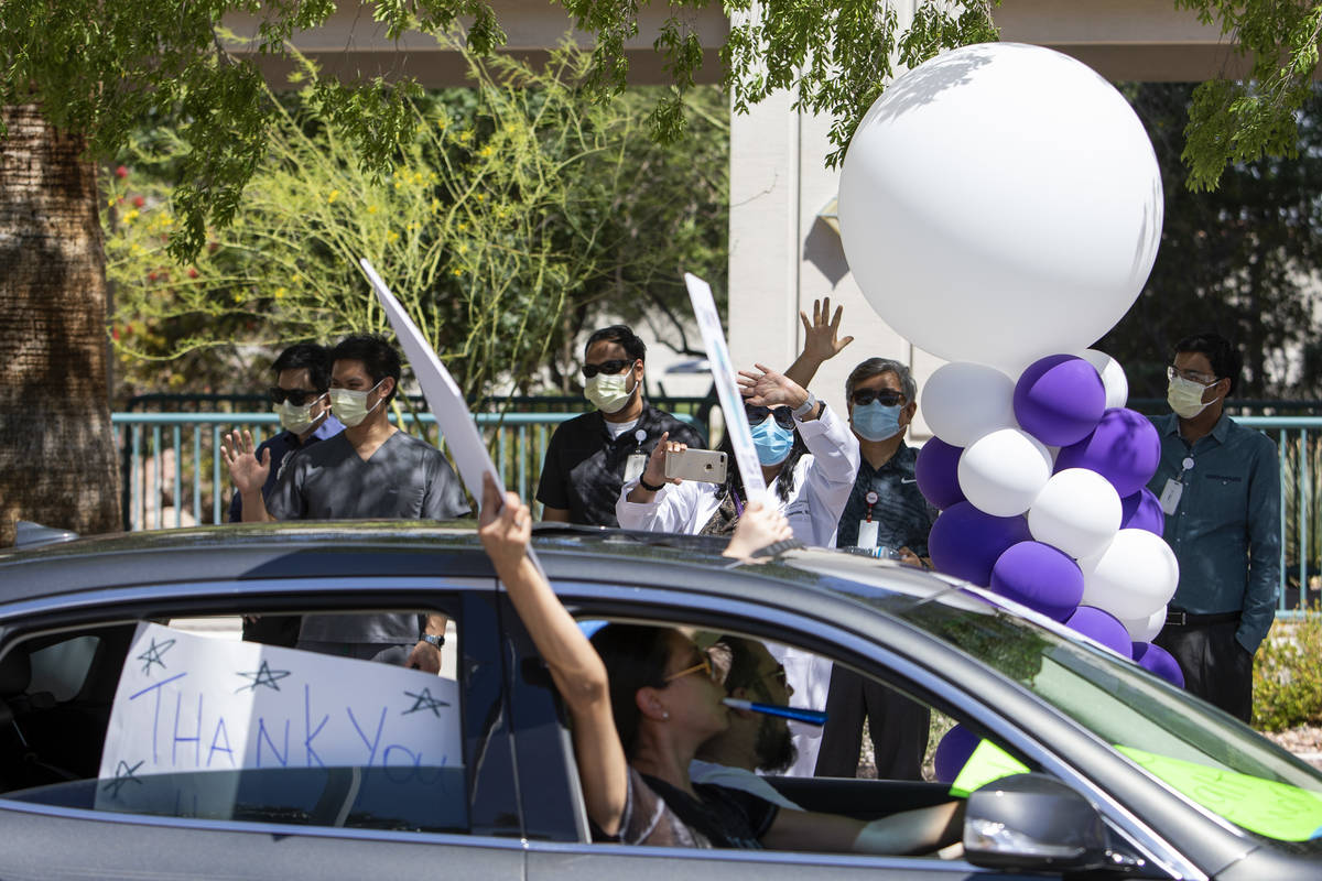 Vehicles drive through to thank Southwest Medical physicians and nurses for their frontline wor ...