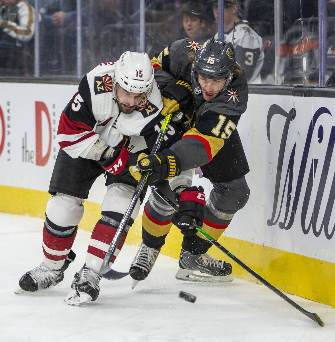 Arizona Coyotes center Brad Richardson (15, left) and Vegas Golden Knights defenseman Jon Merri ...