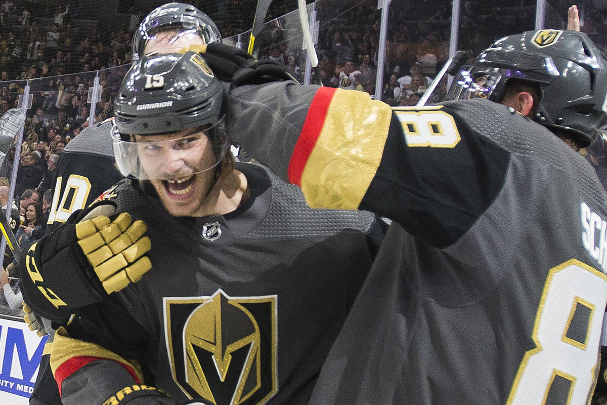 Vegas Golden Knights defenseman Jon Merrill (15) celebrates with Vegas Golden Knights defensema ...