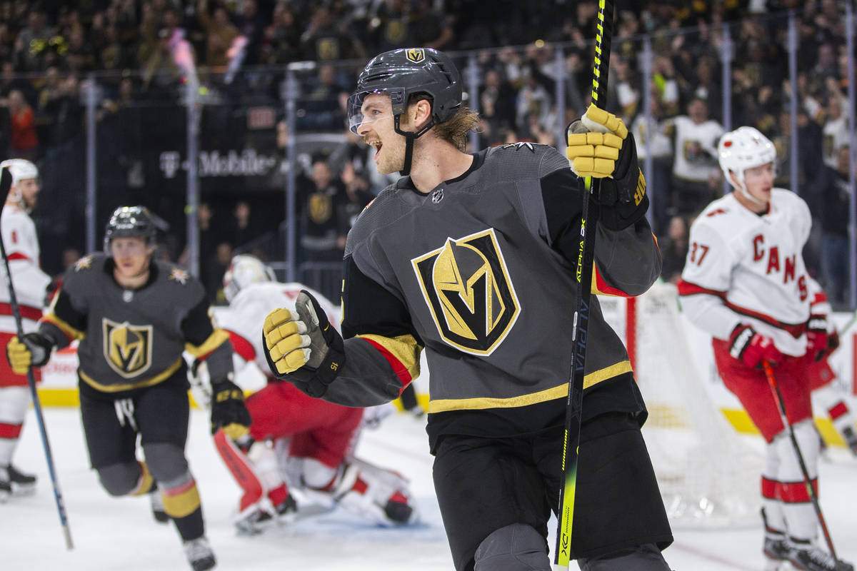 Vegas Golden Knights defenseman Jon Merrill (15) celebrates after scoring a first period goal d ...