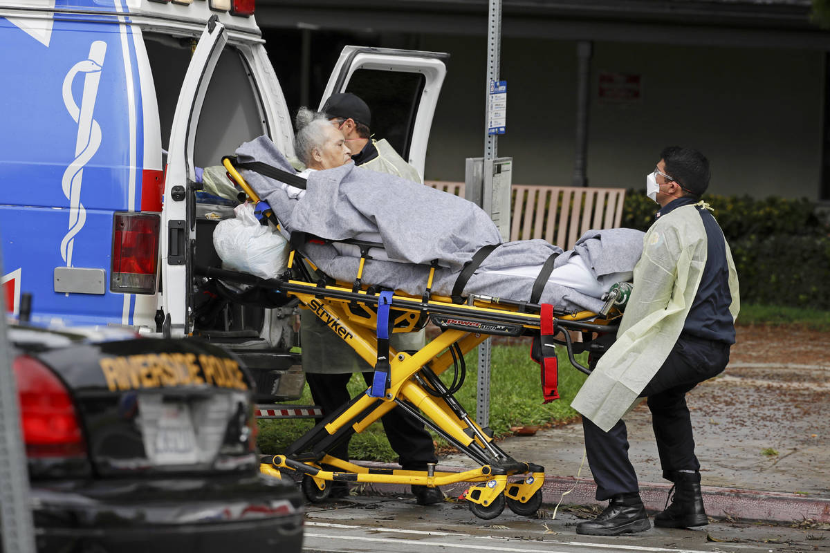 FILE - In this April 8, 2020 file photo, a patient at the Magnolia Rehabilitation and Nursing C ...