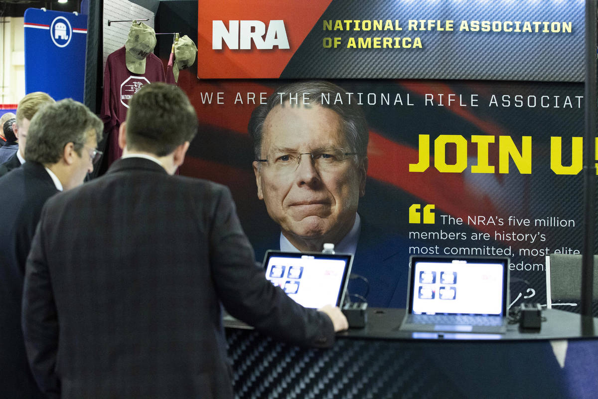 People at the NRA booth during Conservative Political Action Conference, CPAC 2020, at the Nati ...