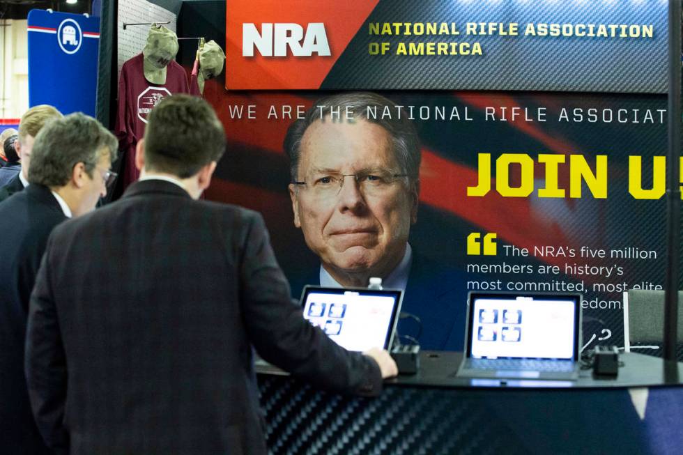 People at the NRA booth during Conservative Political Action Conference, CPAC 2020, at the Nati ...