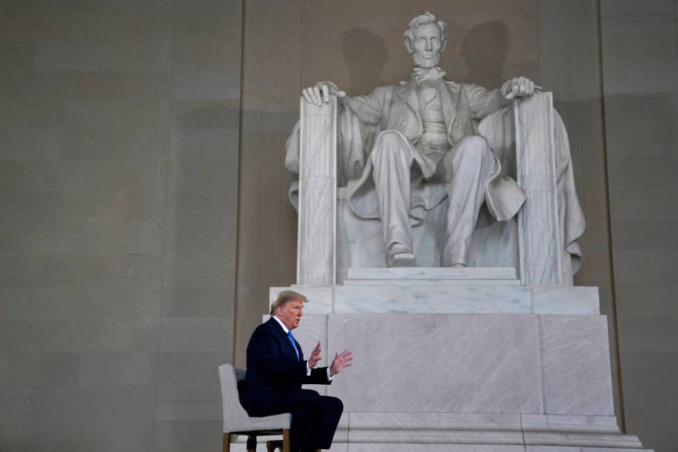 President Donald Trump speaks during a Fox News virtual town hall from the Lincoln Memorial, Su ...