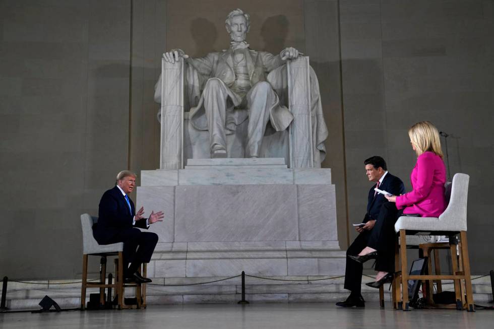 President Donald Trump speaks during a Fox News virtual town hall from the Lincoln Memorial, Su ...