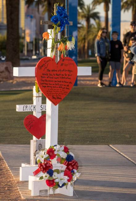 White crosses for Greg Zanis at the "Welcome to Fabulous Las Vegas" sign on Monday, M ...