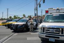 Las Vegas police investigate a downtown shooting in the 1900 block of Fremont Street in Las Veg ...