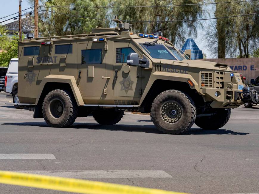 Las Vegas police investigate a downtown shooting in the 1900 block of Fremont Street in Las Veg ...