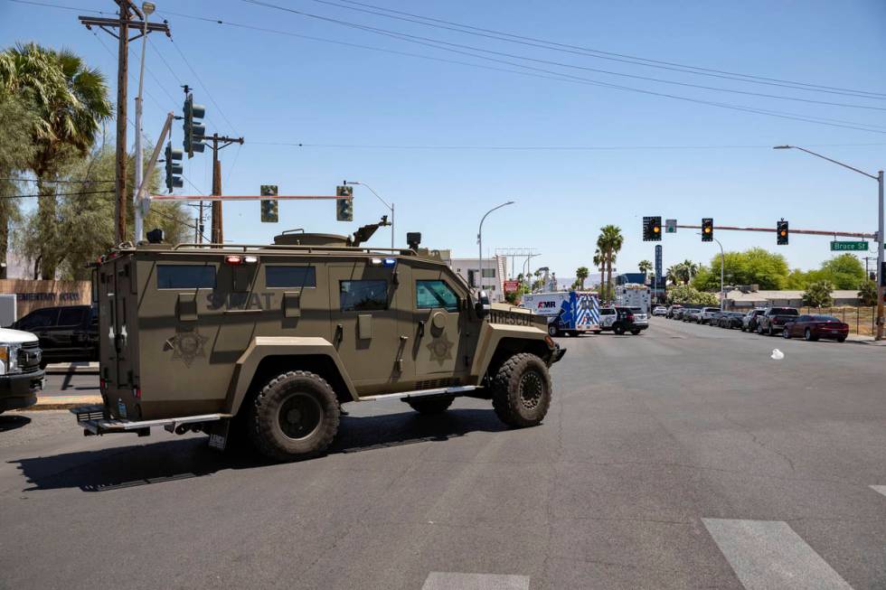 Las Vegas police investigate a downtown shooting in the 1900 block of Fremont Street in Las Veg ...