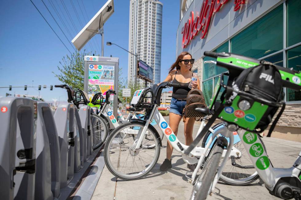 Maribel Leyva rents an RTC Bike Share from the East Sahara Ave., and Las Vegas Blvd., bike shar ...