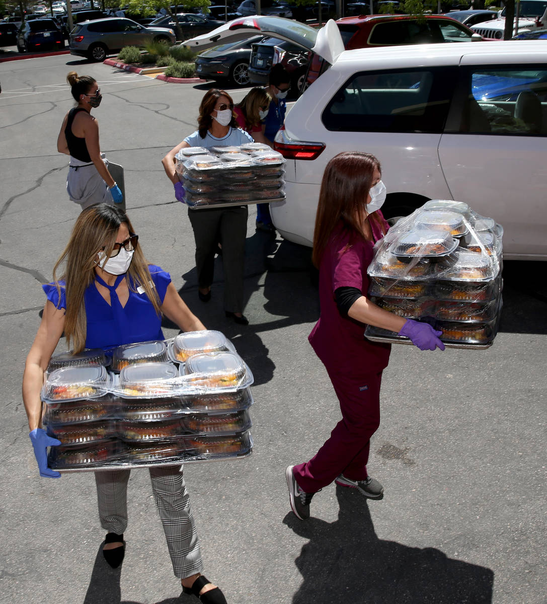 Comprehensive Cancer Centers of Nevada staff members, from left, Connie Gutierrez, office manag ...