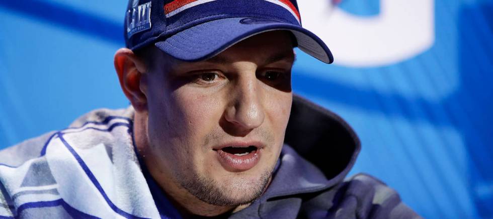 New England Patriots' Rob Gronkowski answers a question during Opening Night for the NFL Super ...