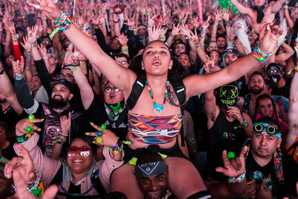Concert goers cheer for Steve Aoki during his performance at the Circuit Grounds stage on day t ...