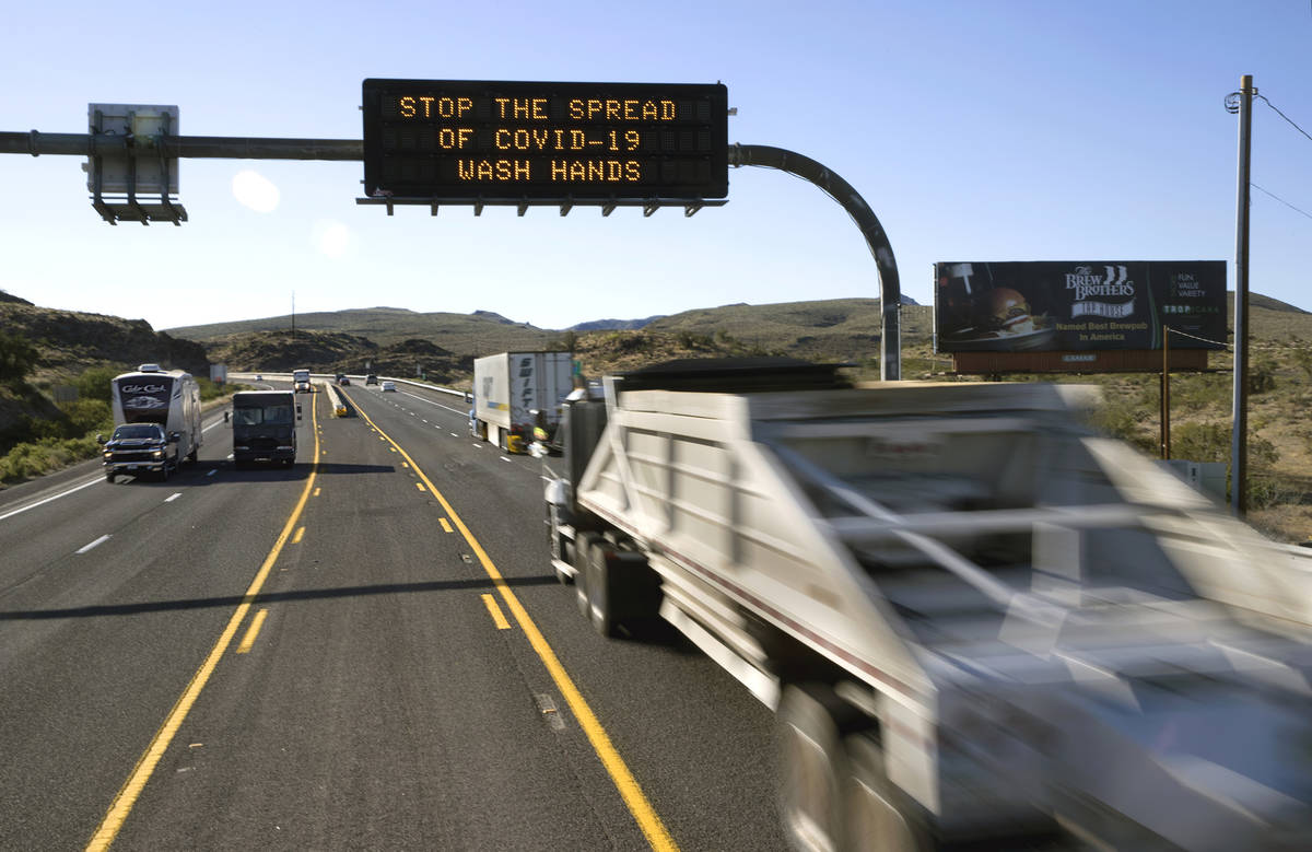 Drivers are encouraged to wash their hands from an electronic reader board along U.S. Highway 9 ...