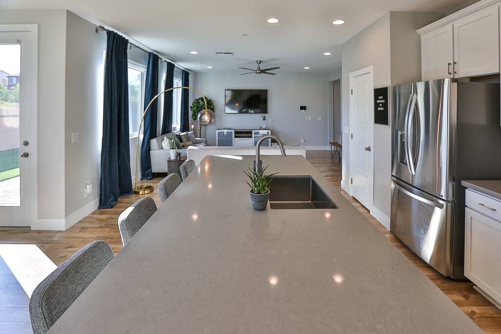 The kitchen island has plenty of seating. (Life Realty)