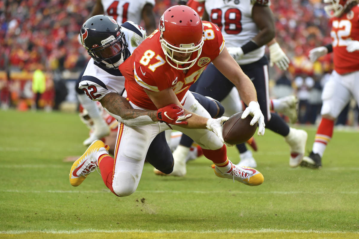 Kansas City Chiefs tight end Travis Kelce (87) scores a touchdown against Houston Texans corner ...