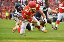 Kansas City Chiefs tight end Travis Kelce (87) scores a touchdown against Houston Texans corner ...