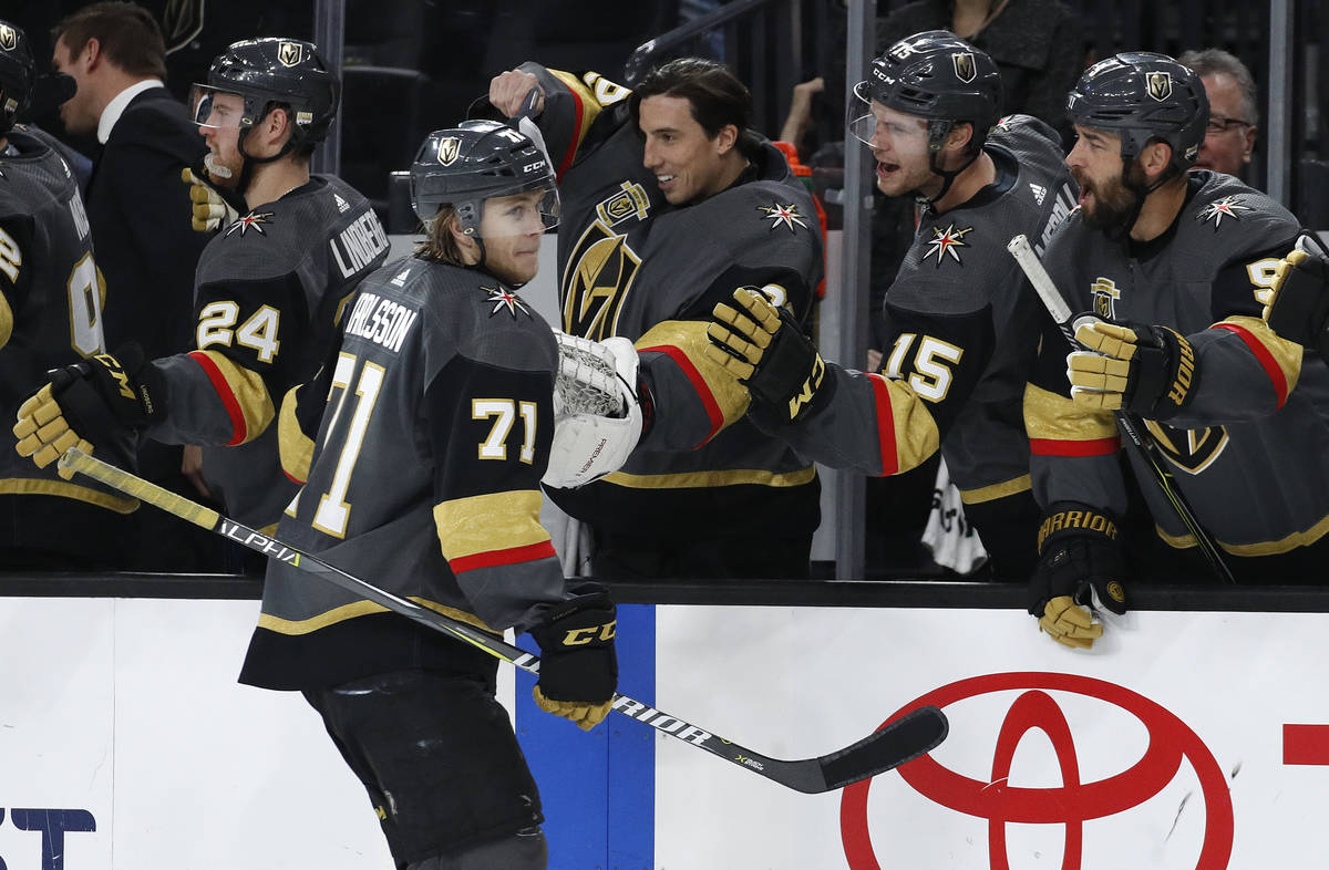 Vegas Golden Knights center William Karlsson (71) celebrates after scoring a hat trick against ...