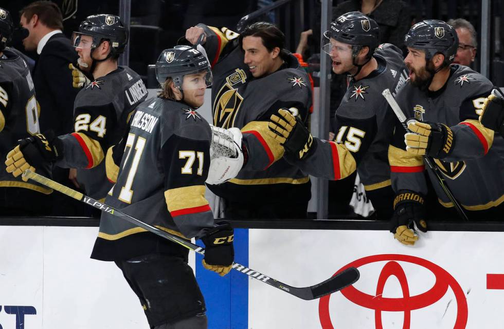 Vegas Golden Knights center William Karlsson (71) celebrates after scoring a hat trick against ...